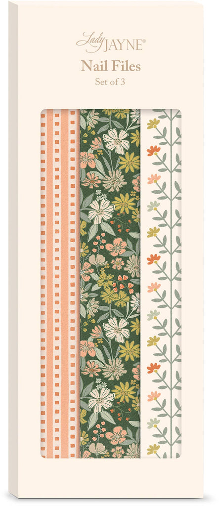 Set of nail files with floral designs on a white background