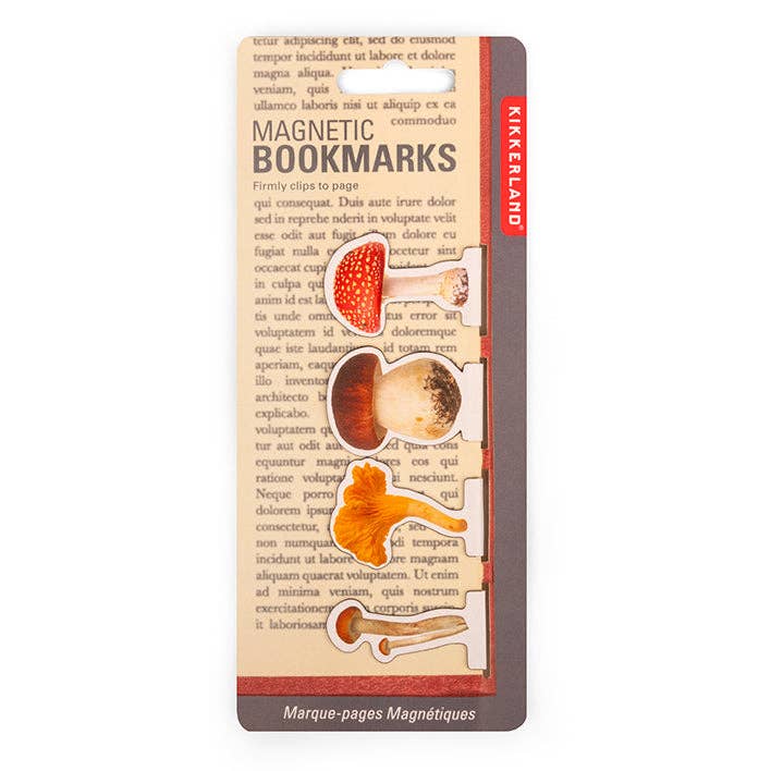 Pack of magnetic mushroom bookmarks with a vintage-style design on a book page background