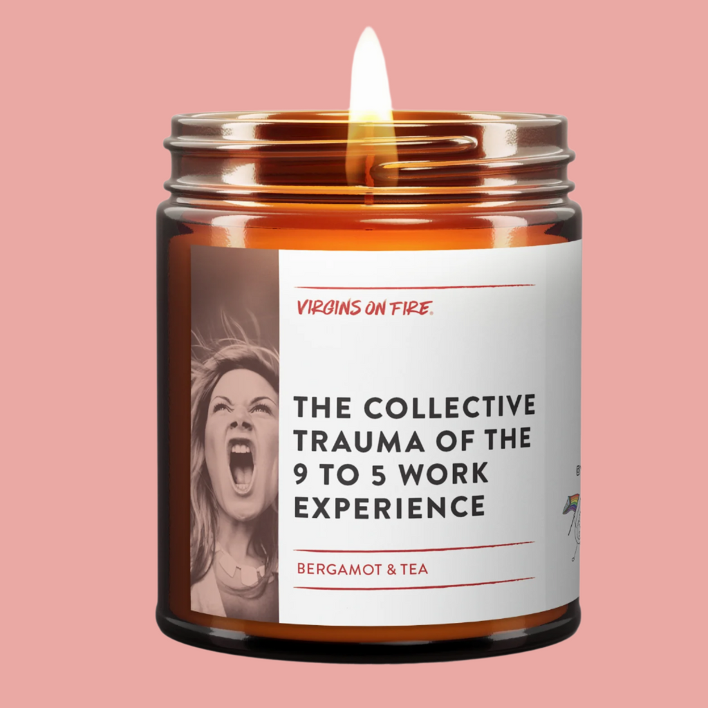 candle with label "the collective trauma of the 9 to 5 work experience"  with bergamot & tea smell