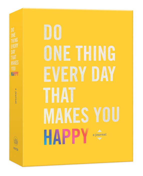 A yellow book titled 'Do One Thing Every Day Happy' with a colorful quote on the cover.